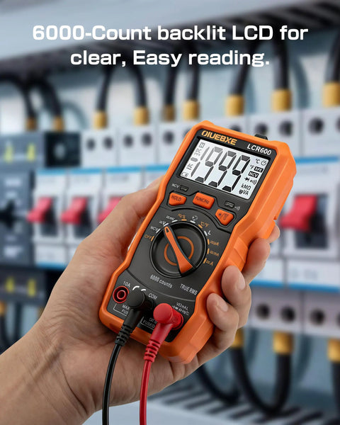 Hand holding 6000-Count Auto-Ranging LCR Meter Multimeter with backlit LCD, in electronics setup.