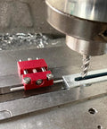 Precision Adjustable Vise Work Stop And Quick Clamp Jaw Featuring Hella Tough Red Anodized Aluminum Build on a milling machine.