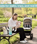 Portable 22oz Stainless Steel Breast Milk Cooler Bottle Keeps Pumped Stash Ice Cold For Up To Twenty Four Hours Goes Hard For Moms On The Go All Day Long beside a mother feeding her baby.