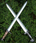 Two Pack 25 Inch Medieval Viking PU Foam Sword For Adults Costume Weapon Safe Soft Foam Larp Prop crossed on grass