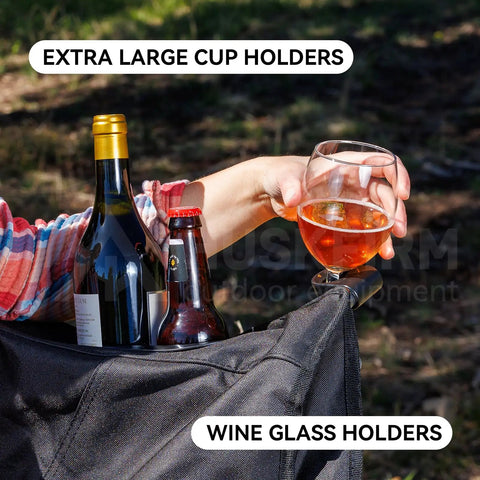 Person holding wine glass in Two Person Oversized Camping Chair Loveseat For Adults Heavy Duty Folding Outdoor Couch