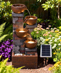 Five Tier Solar Outdoor Water Fountain With LED Lights 33 Point 5 Inch Tall Waterfall For Patio Or Backyard Easy Setup Solar Pump And Panel Included Decorative Pebbles Yard Vibe shown in garden setting