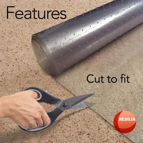 Deluxe Clear Vinyl Floor Runner For Deep Pile Carpets, Non Slip And Stain Resistant, being cut to fit on carpet