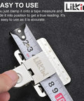 Close-up of hand using 2 Pack Double Scale Measuring Tape Clips In 304 Stainless Steel Corner Measuring Tool for precise reading