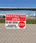 Step Up Site Security With Heavy Duty Reflective Aluminum Warning Signs Bold Restricted Area and Do Not Enter Text Shields Authorized Personnel Only Areas Rugged Waterproof Plates Measure 14 By 10 Inches Zero Sweat Hang Indoors Or Outdoors on a chain link fence.