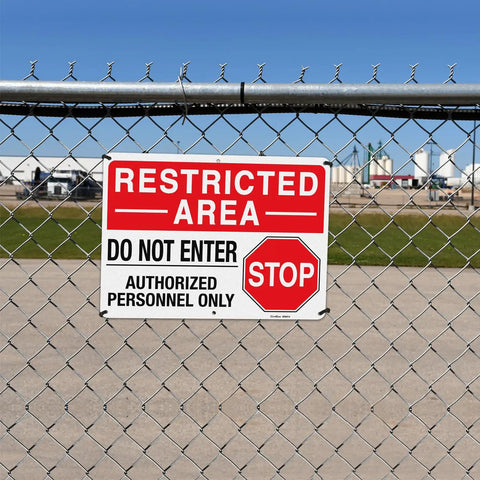 Step Up Site Security With Heavy Duty Reflective Aluminum Warning Signs Bold Restricted Area and Do Not Enter Text Shields Authorized Personnel Only Areas Rugged Waterproof Plates Measure 14 By 10 Inches Zero Sweat Hang Indoors Or Outdoors on a chain link fence.