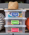 Top Shelf 2 x 4 Shipping Labels 1000 Count White Mailing Stickers on storage bins for organizing toys, games, and books.