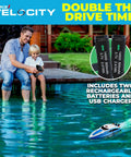 Father and son playing with Velocity Blue RC Boat For Pools And Lakes, Super Fast Remote Control Boat For Adults And Kids, 2 4GHz Transmitter