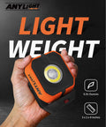 Hand holding a Magnetic Rechargeable 1200 Lumen Work Light With Four Modes And 150 Degree Rotatable Head Waterproof Portable Spotlight.