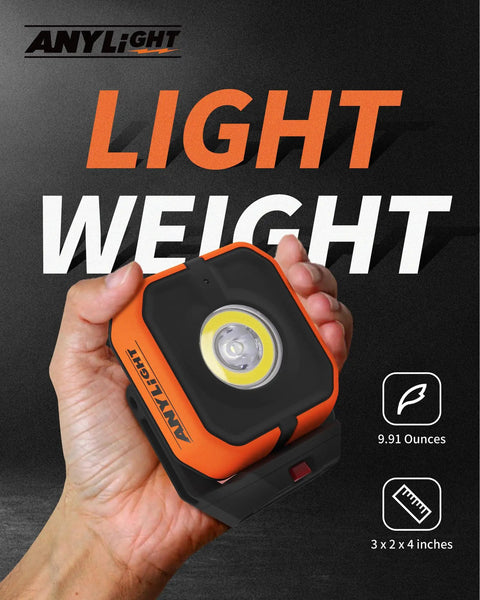 Hand holding a Magnetic Rechargeable 1200 Lumen Work Light With Four Modes And 150 Degree Rotatable Head Waterproof Portable Spotlight.