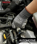 Hand wearing PU Coated Touchscreen Work Gloves 18 Pair Pack For Men And Women, Lightweight Mechanic Gloves, working on a car engine.