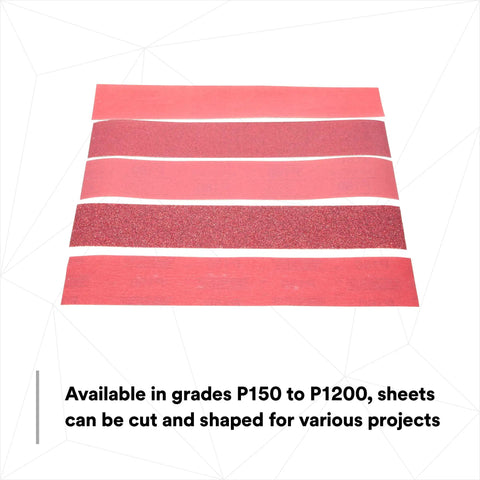 Displayed are strips of Stikit Red Abrasive Sheet Roll Two And Three Quarter Inch By Twenty Five Yard 400 Plus Grade No Hole Automotive Sanding