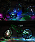 Two kids' bikes with Rechargeable LED Bike Wheel Light A16 7 Color Spoke Light With 16 Modes glowing in the dark.