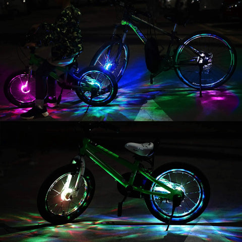 Two kids' bikes with Rechargeable LED Bike Wheel Light A16 7 Color Spoke Light With 16 Modes glowing in the dark.