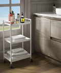 3-Tier Metal Utility Rolling Cart With Lockable Casters in bathroom setting, white 12.1 D x 17.7 W x 31.2 H rectangular industrial style