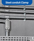 Steel conduit clamps secure zinc plated pipes, showcasing Heavy Duty One Hole 1/2 Emt Straps 100 Pack Zinc Plated Steel Conduit Clamps For Electrical Tubing.
