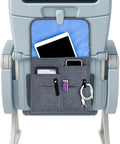 The Low Key Essential Airplane Seat Back Organizer Expands Over Tray Tables To Keep Your Commuter Carry On Gear Crisp And Stress Free During Every Seamless Flight journey, featuring a gray fabric design with slots for devices and pens.