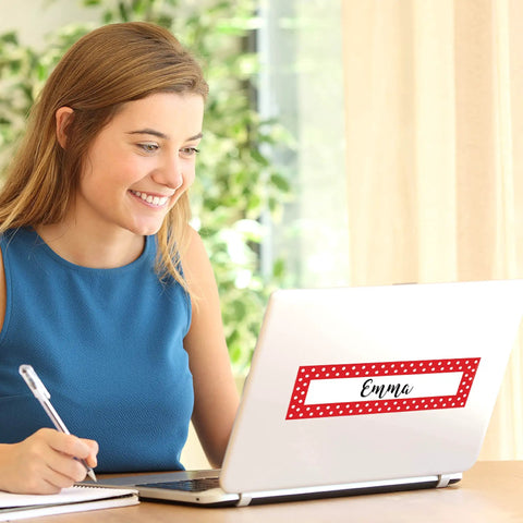 Woman using laptop with Double Sided Desk Nameplates And Bulletin Board Signs In Red And White Dots 3.5 x 12 inch