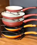 Keep Your Cookware On Deck With This Heavy Duty Pan Organizer Rack Bronze Finish Free Standing Lid Holder Metal Shelf For Cabinets Counters Effortless Setup with stacked pans.