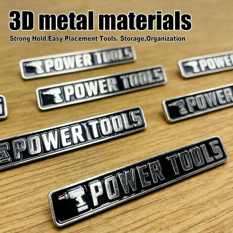 12 Pack Magnetic Toolbox Labels Set With 3D Embossed Metal Tags For Pro-Grade Tool Chest Organization, Waterproof And Reusable Identification Badges For Wrenches, Sockets, And Pliers In Black Finish shown on wooden surface