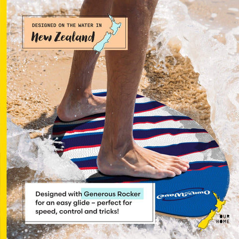 Person using Claw Strike Skimboard 40 Inch Blue Dope Wave Rider for beach fun, designed in New Zealand, on sandy beach.