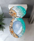 Elongated Resin Toilet Seat with Cover featuring beach design with shells and starfish, suitable for most toilet sizes.