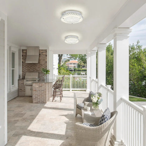 Covered porch with Crystal Ceiling Light With Memory Function Dimmable LED Chandelier installed above wicker furniture, exterior view.