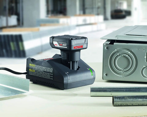 12V Max Lithium Ion Battery Charger with Dual Mode Fast and Standard Charge, quick indicator lights, for 12V tools in workshop setting.