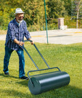 Man using 24 Inch Lawn Roller With 13 Gallon Capacity Heavy Duty Steel Yard Roller For Garden And Park Lawns