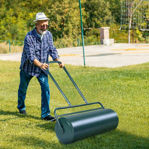 Man using 24 Inch Lawn Roller With 13 Gallon Capacity Heavy Duty Steel Yard Roller For Garden And Park Lawns