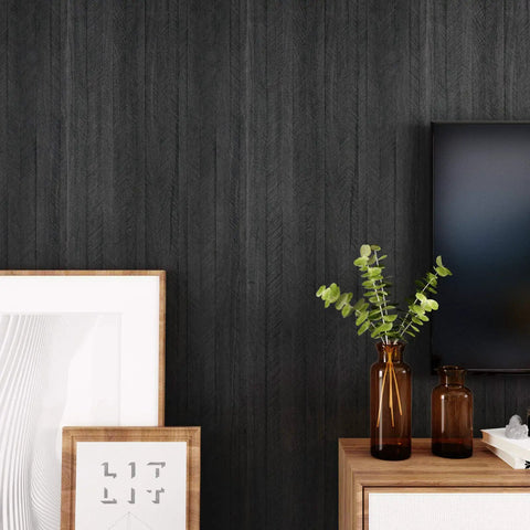 Black Wood Countertop Contact Paper Peel And Stick Waterproof Self Adhesive Faux Wood Grain Vinyl Wrap For Countertops, Cabinets, Walls, And Furniture 15.8 X 393 Inches 43 Sq Ft applied on wall next to decor items.