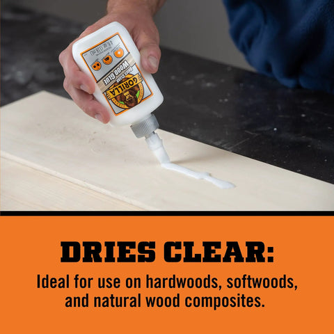Clear Wood Glue For Fast Strong Bonds Pack Of Two 4 Ounce Bottles Water Resistant being applied on wood surface