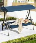 Woman relaxing on upgraded 3 seat porch swing with canopy and stand for backyard patio, 180 degree recline, blue square tube