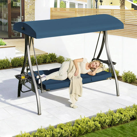 Woman relaxing on upgraded 3 seat porch swing with canopy and stand for backyard patio, 180 degree recline, blue square tube