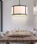 Oil Rubbed Bronze LED Pendant Light For Kitchen Island With White Linen Drum Shade above dining table