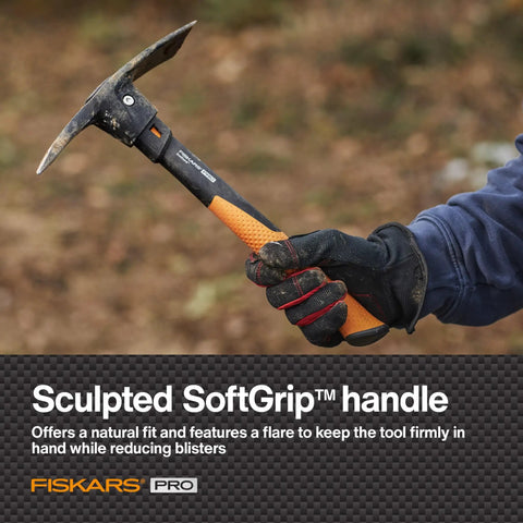 Person holding IsoCore Pickaxe Mattock With Shock Absorbing Handle Dual Head For Roots And Rocks 1.5 Lb Heavy Duty Tool
