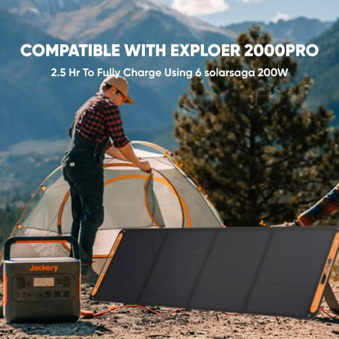 Person setting up a campsite with SolarSaga 200W Portable Foldable Bifacial Solar Panel IP68 next to power station in outdoor setting.