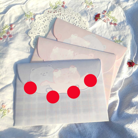 Colorful envelopes with red stickers on a floral tablecloth
