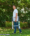 Person carrying 8.5 Foot Aluminum Telescoping Ladder With One Button Retraction Easy Pull Portable Foldable Extension Ladder