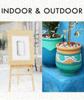 Clear Matte Finish Spray Locks Down Every Surface With A Smooth Non Glossy Look That Will Not Yellow Over Time Dries Fast Covers Big Squares Perfect For Weekend Warriors Keeps Your Gear Looking Clean And Protected Zero Shine Now 11 Oz Can on painted flower pots and an easel with sketch.