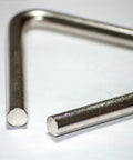 Triangle Percussion Instrument Handcrafted In USA By Nashville Small Biz, Premium Alloy Triangle For Rich, Warm Chime Tone, Supports American Jobs, Made In Tennessee Music Gear. close-up of metal triangle corner