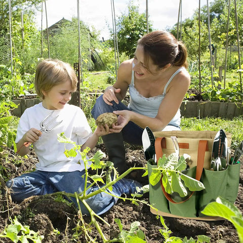 Mother and child gardening with Heavy Duty Garden Tools Set Of 10 With Stainless Steel Tools And Wooden Handles beside them.