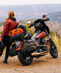 Motorbike with Chrome Stainless Steel Motorcycle License Plate Frame With Red Reflectors And Rustproof Hardware on scenic road