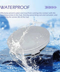 4 Pack Universal Snap In Wheel Center Caps High Polish Silver Rim Hub Covers OD 60mm ID 56mm in water, showcasing waterproof feature.