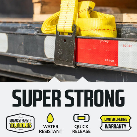 Rugged 2 Inch By 27 Foot Tie Down Straps Pack Of 4 With Flat Hooks Heavy Duty Ratchet Cargo Straps For Trailers And Trucks Yellow Load Securement For Safe Hauling in use on a trailer.