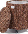 Round Water Hyacinth Storage Basket With Lid And Wheels Boho Chic Natural Rattan Bin with lid open, showing soft fabric liner and wheels