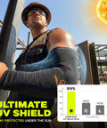 Man wearing All Day Cool Arm Sleeves For Men And Women With UV Protection in construction setting, sun in background, UV block graphic visible.