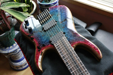 Close-up of a guitar with multi-color finish using Brite Tone High Solids Water Based Polyurethane Instrument Finish Gloss No Yellowing.