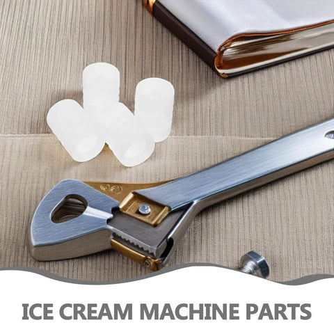 Silicone Sealing Gasket Set With Wave Sleeves, 4 Piece Replacement Kit For Ice Cream Makers, shown next to wrench.