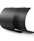 Two flexible all-black solar panels, part of the 200W Flexible Solar Panel Kit Two 100W Panels All Black Stealth Edition with ETFE Monocrystalline Modules 12V/24V System for RV Motorhome Boat Van Camper Road Trip Ready and Bendable for Curved Roofs, shown in a curved position.